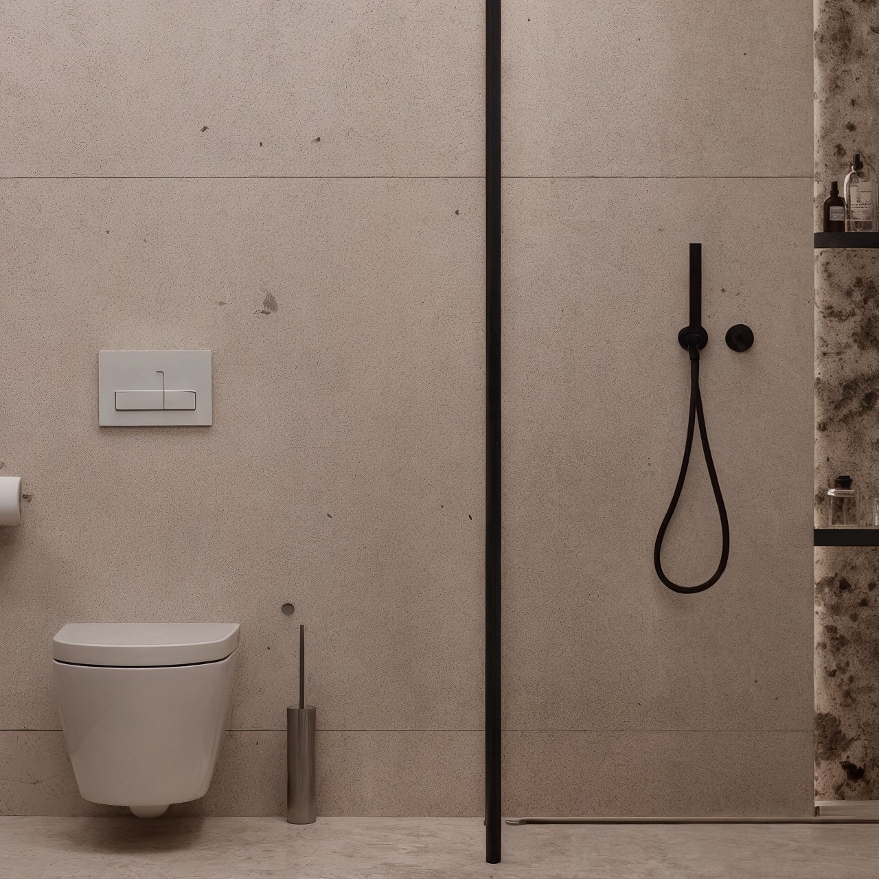 Wall-hung toilet beside a frameless shower with black fixtures and stone wall tiles.