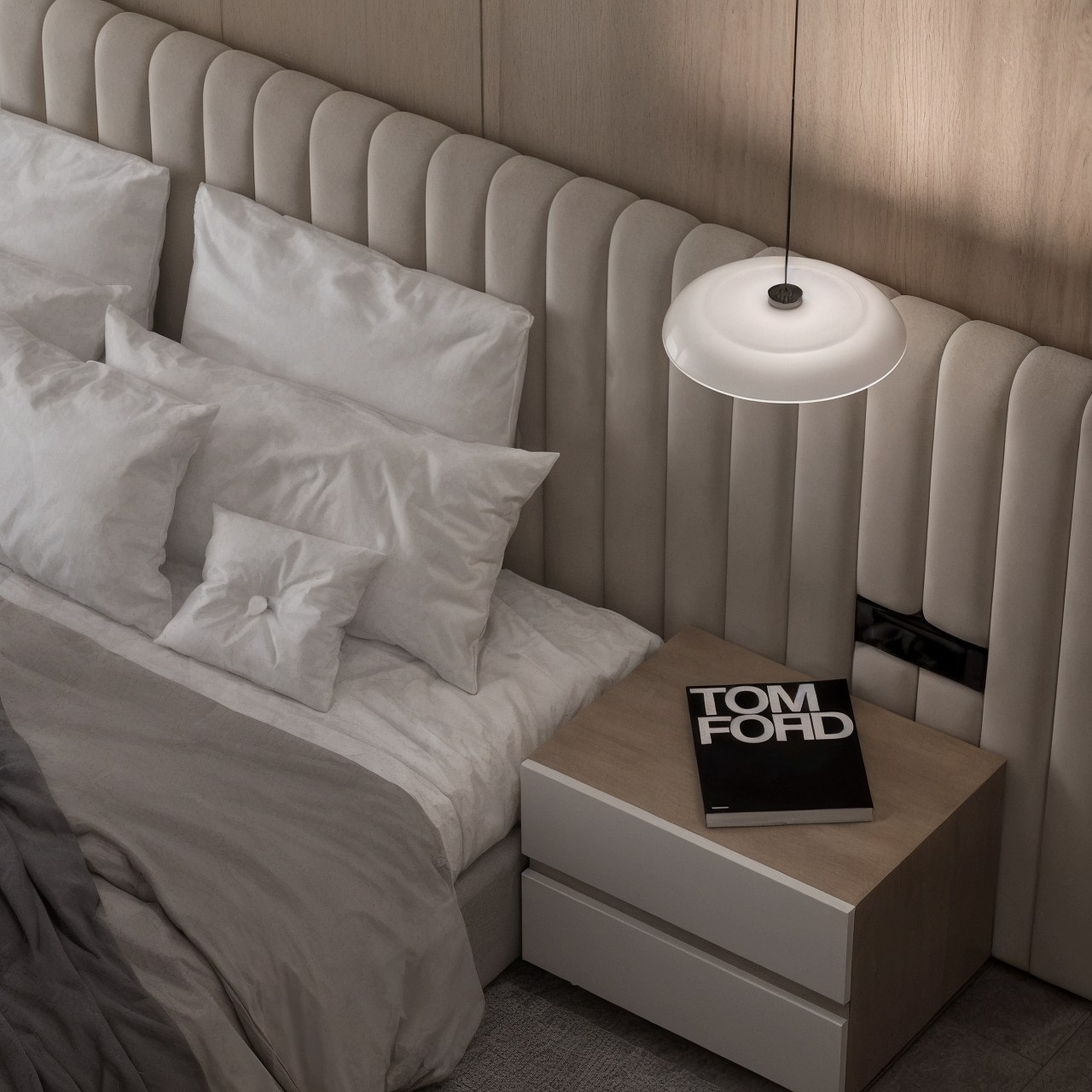 Upholstered bed with paneled headboard, pendant bedside light and pale timber wall.