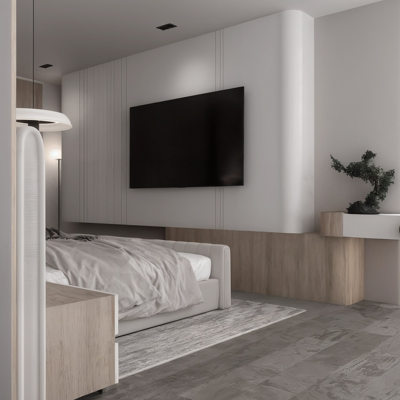 Minimal bedroom with upholstered bed, wall-mounted television and pale timber cabinetry.